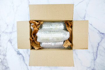 Cardboard box with Bubble wrap for packing, honeycomb paper hexagonal shape for protection product...