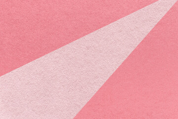 Fototapeta premium Texture of old craft light red and pink color paper background, macro. Structure of vintage abstract rose cardboard