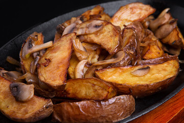 Homemade baked potatoes with mushrooms and onions