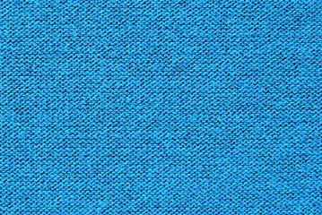Blue color knitted fabric texture as background