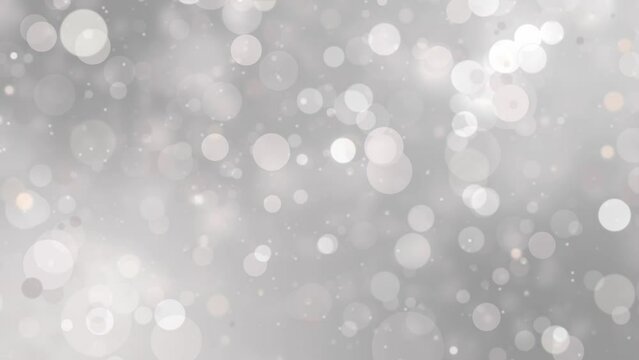 Abstract glitter lights gray background. Seamless looping video footage. (018_warm gray)