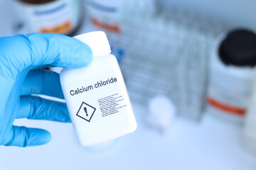Calcium chloride in bottle , chemical in the laboratory and industry