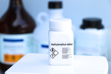 Methyleneblue tablet in bottle , chemical in the laboratory and industry