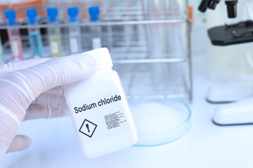 Sodium chloride in bottle , chemical in the laboratory and industry