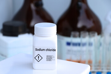 Sodium chloride in bottle , chemical in the laboratory and industry