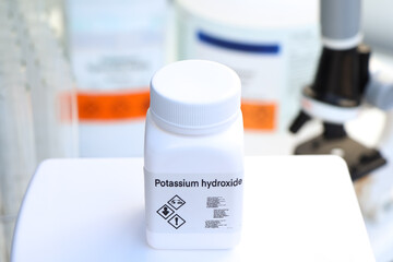 Potassium hydroxide in bottle , chemical in the laboratory and industry