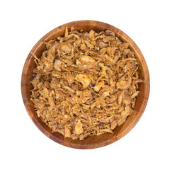 Top view of dried fried onions with salt in a wood bowl isolated on a white background.