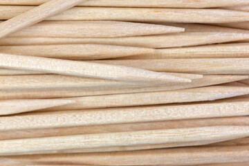 Close view of round wood toothpicks.