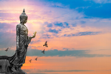 Fototapeta premium Buddha images belief in Buddhism, Big buddha statue on sky