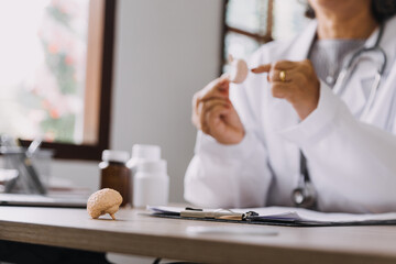 Homecare nursing service and elderly people cardiology healthcare. Close up of young hispanic female doctor nurse check mature caucasian man patient heartbeat using stethoscope during visit