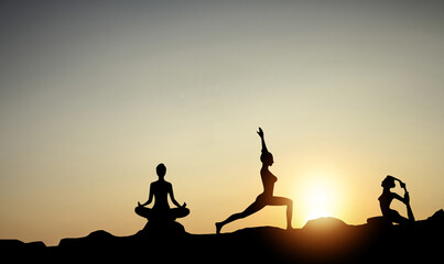 Silhouette of a beautiful Yoga woman in the morning
