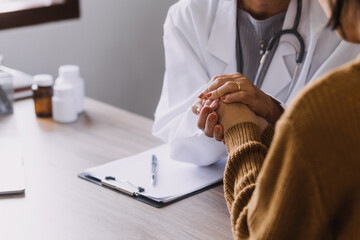 Homecare nursing service and elderly people cardiology healthcare. Close up of young hispanic female doctor nurse check mature caucasian man patient heartbeat using stethoscope during visit