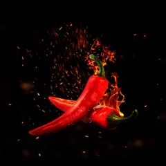 Foto auf Acrylglas Scharfe Chili-pfeffer Red hot chili peppers on fire
