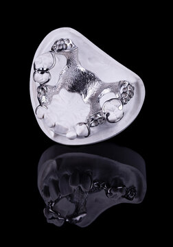 Metal frame of a partial prosthesis on a plaster model