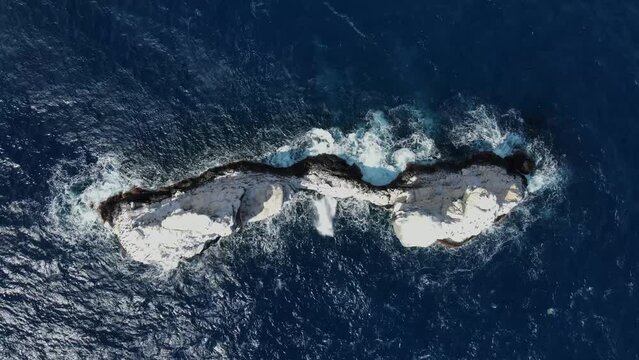 Aerial view of a small island along Isla san Benedicto coastline, Colima, Mexico.