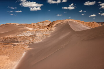Fototapeta na wymiar The great sand dune in Valle de la Luna (Moon Valley) in the Atacama desert, Norte Grande, Chile