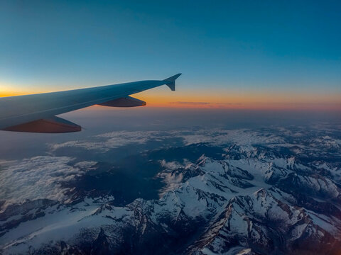 Plane Window View over Mountains © Eric