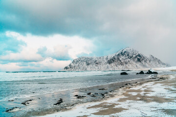 Norway coast in winter with snow bad cloudy weather