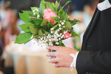 bride and groom holding hands