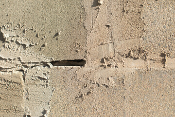 Concrete wall. Raw wall surface. Stonework.
