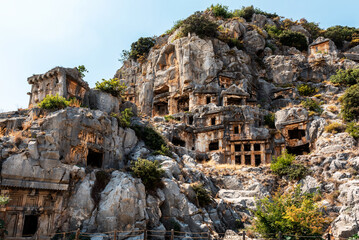 Rock-cut tombs in Myra Ancient City. The Ancient City of Myra, located in Antalya’s Demre province. - obrazy, fototapety, plakaty