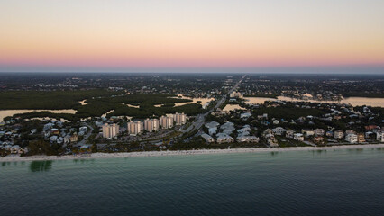 The final moments of light on Bonita Beach in Bonita Springs, FL as the sunsets over the Gulf of Mexico.