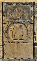 Historic stone slab on the Cathedral of St. Peter and Paul in Brno