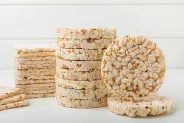 Rice cakes on white texture wood. Close-up. Healthy food. Diet food.Place for text.Space for copy.