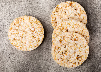 Rice cakes on a textured table. Close-up. Healthy food. Diet food.Place for text.Space for copy.