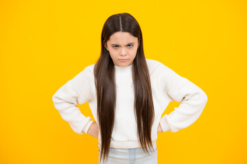 Angry teen girl. Child looking at camera with hate and rage negative facial expression. Unhappy sad teenager girl.