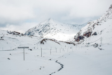 Beautiful winter Alps of Switzerland. Snowy winter mountains landscape