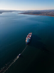 Aerial top view container ship, shipping or transportation concept background.