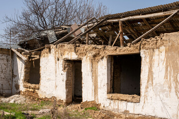 Fototapeta na wymiar an abandoned house without windows and doors