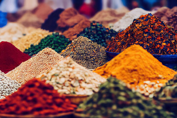 Piles of spices on display at a Moroccan souk market in a medina, generative AI - obrazy, fototapety, plakaty