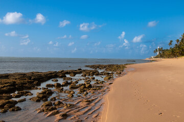 Brazilian beach, at low tide, with exposed reefs