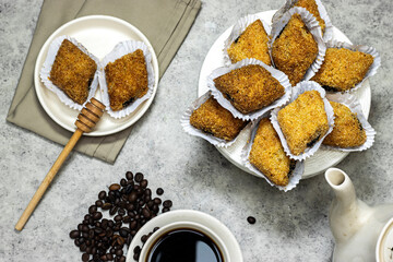 Fried Makrout or makroud - Algerian semolina, dates and honey sweets, traditional North Africa sweet food for islam with coffee