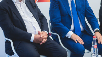 Audience at the conference hall listens to lecturer, people on a congress together listen to...