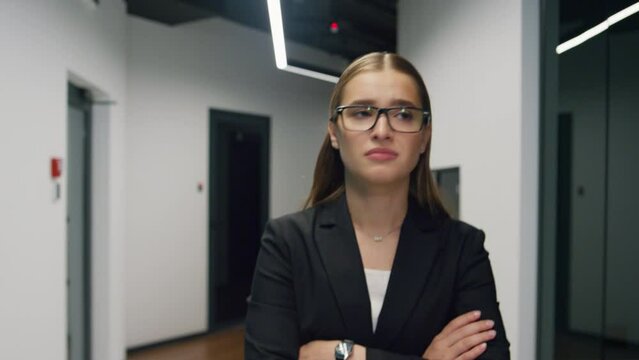 Depressed manager walking office corridor closeup. Upset girl feeling desperate
