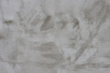 The wall is covered with rough putty.