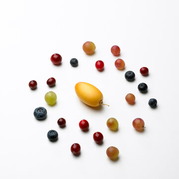 Variety of Fruit Surrounding Fresh Date