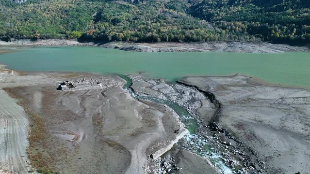Roman bridge and sunken town of Saqu&eacute;s in the Bubal reservoir. Aerial view from a drone. Jaca Stone. Biescas Municipality. The Jacetania. Huesca, Aragon, Spain, Europe