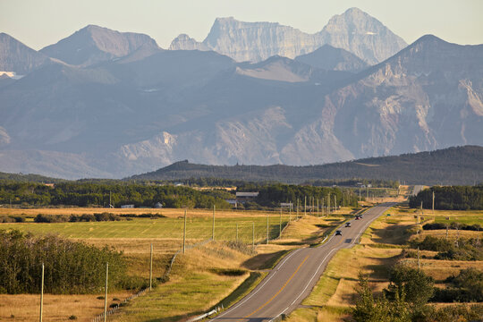 Rural Road and Rocky Mountains, Pincher Creek, Alberta, Canada