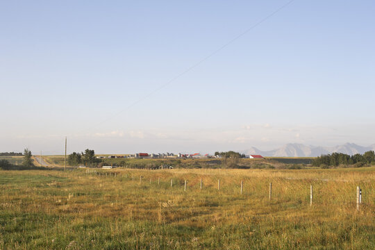 Prairie Farm and Fields, Rocky Mountains in Distance, Utopia Farm, Pincher Creek, Alberta, Canada