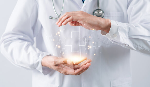 Doctor in white coat holding plus sign for positive healthcare insurance symbol concept, Mental health care, medical check up concept.