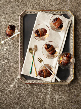 Overhead View of Devils on Horseback Appetizers on Tray, Studio Shot