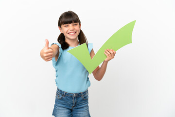 Little caucasian kid isolated on white background holding a check icon with thumb up