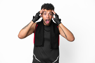 Sport brazilian man with towel isolated on white background with surprise expression