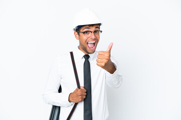 Architect brazilian man with helmet and holding blueprints with thumbs up because something good has happened