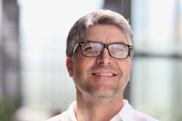 Obraz premium portrait of a successful businessman with glasses
