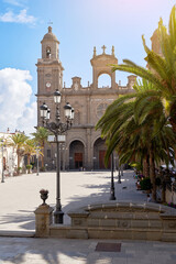 Fototapeta na wymiar Street lantern in front of the Cathedral of Santa Ana in Las Palmas, Canary Islands on a sunny day